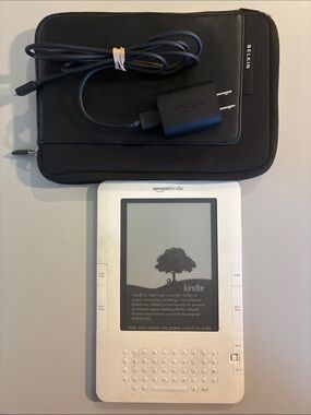 Amazon White Kindle e-Reader with Black Belkin Sleeve and Charger